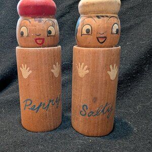 Wooden novelty salt and pepper shakers titled 'Salty and Peppy'